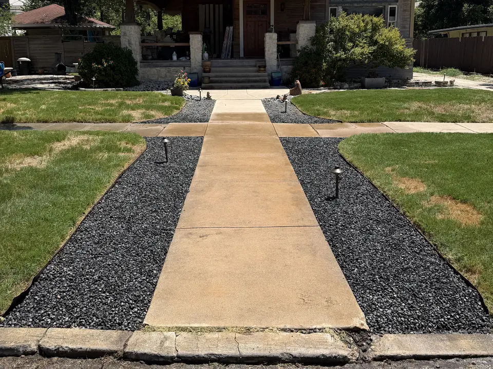Fresh rock for two front beds · After